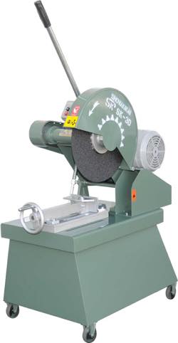 Friction sawing machine with a table